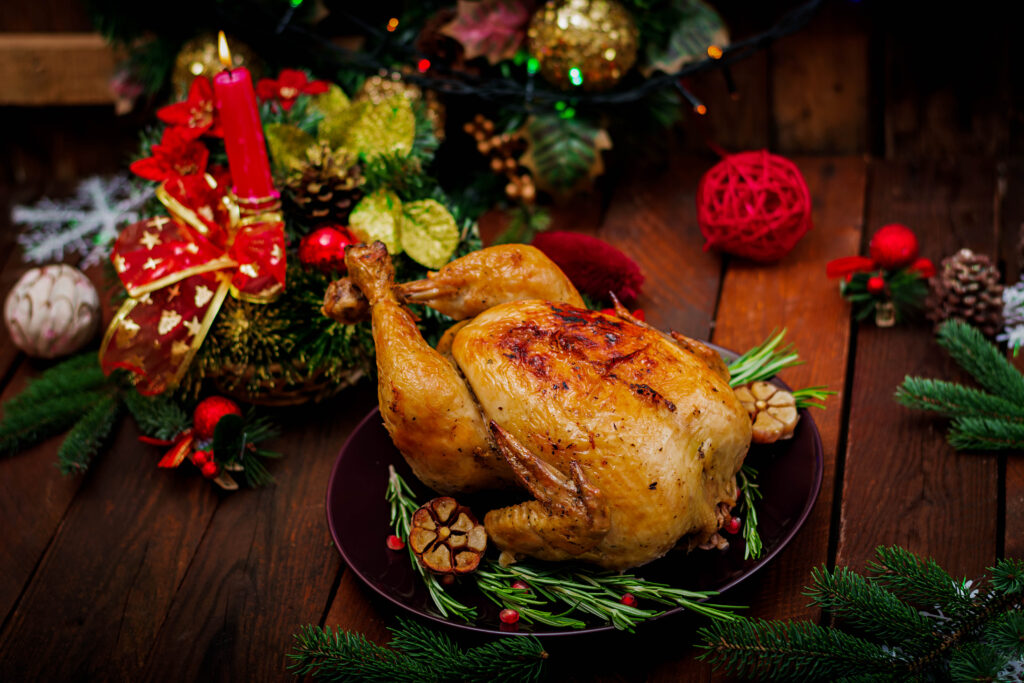 Baked turkey or chicken. The Christmas table is served with a tu