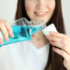 young girl uses mouthwash at home. High quality photo