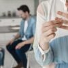 close-up-woman-taking-wedding-ring-off